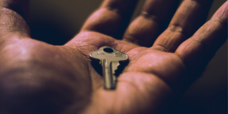 key in man's hand